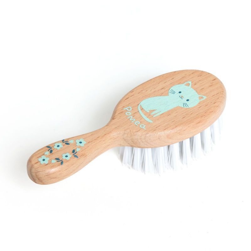 brosse-a-cheveux-pour-poupee-pomea-de-djeco-7795.jpg